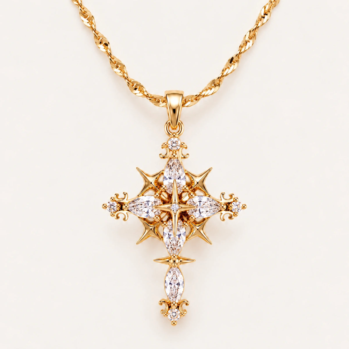 Gold Celestial Gothic Cross Necklace with Clear Zirconia Accents on an Ivory Background