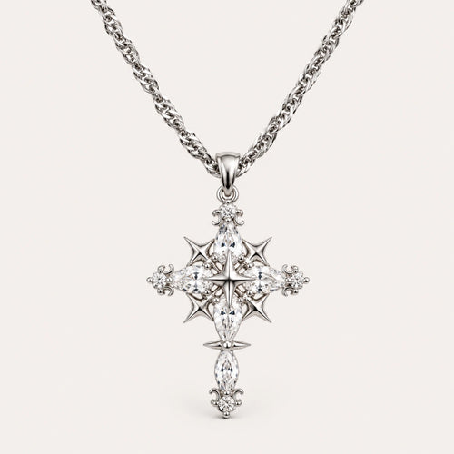 Silver Celestial Gothic Cross Necklace with Clear Zirconia Accents on an Ivory Background