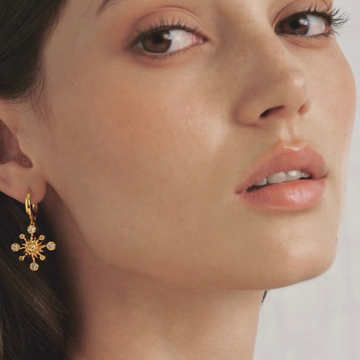 Starlight Aura Radiant Starburst Hoop Earrings