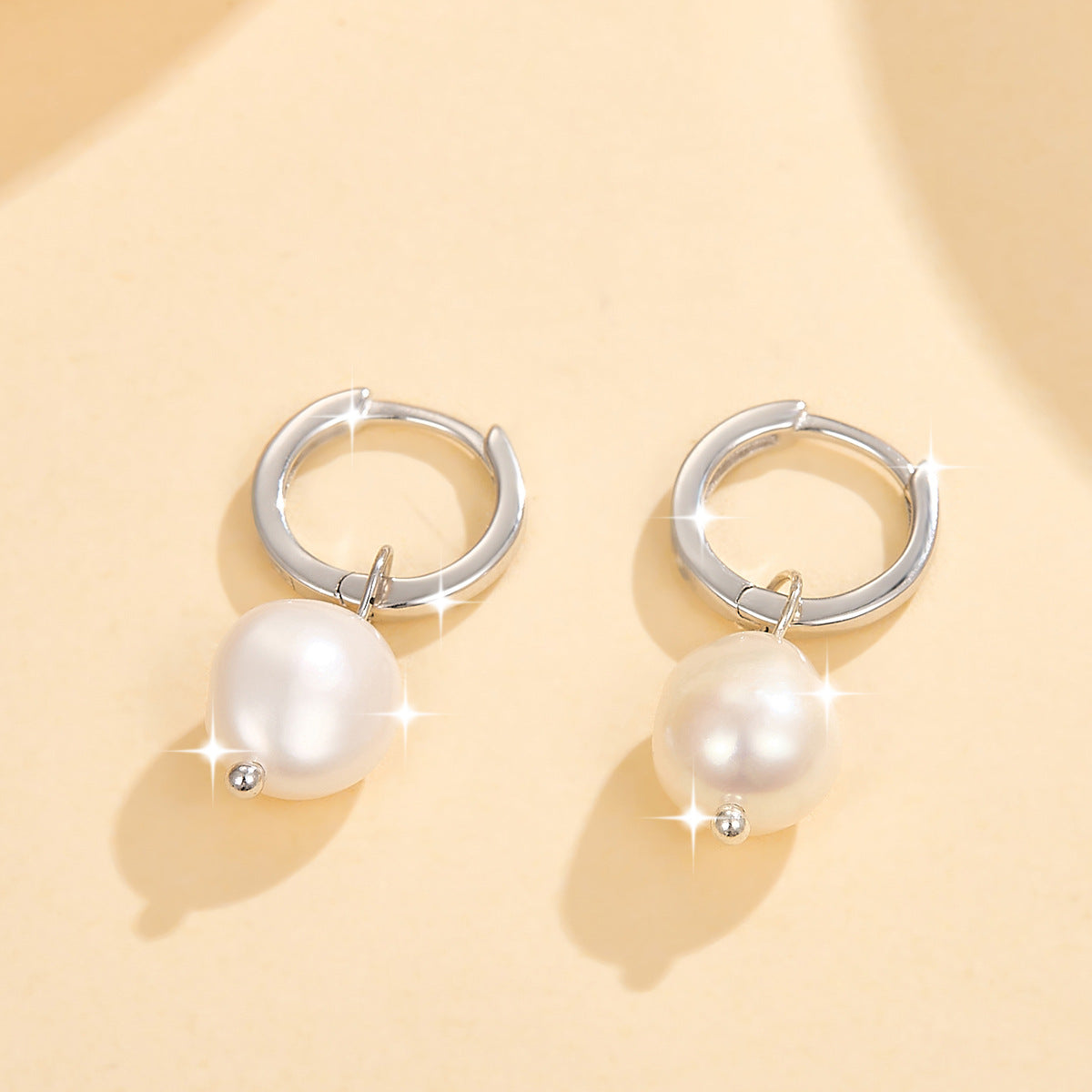Starlight Aura Elegant Pearl Drop Earrings