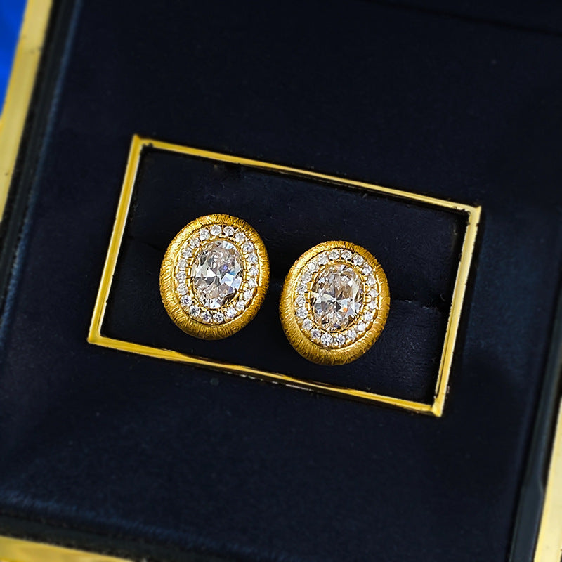 Mujing Jewelry's new European and American S925 silver-plated gold vintage egg-shaped brushed earrings with a sophisticated and versatile design