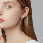 European and American fashion emerald floral sterling silver earrings for women with a light luxury 925 silver emerald stud earring, a high-end silver jewelry
