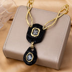 A niche minimalist European and American emerald-set necklace with diamond inlay by the genius designer Alexis Bittar