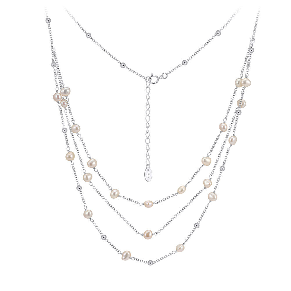 Triple-Layer Freshwater Pearl Necklace with Sparkling CZ Accents – Adjustable Layered Chain Necklace