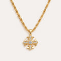 Gold Rotating Fleur-de-Lis Cross Necklace with Sparkling Zirconia Accents