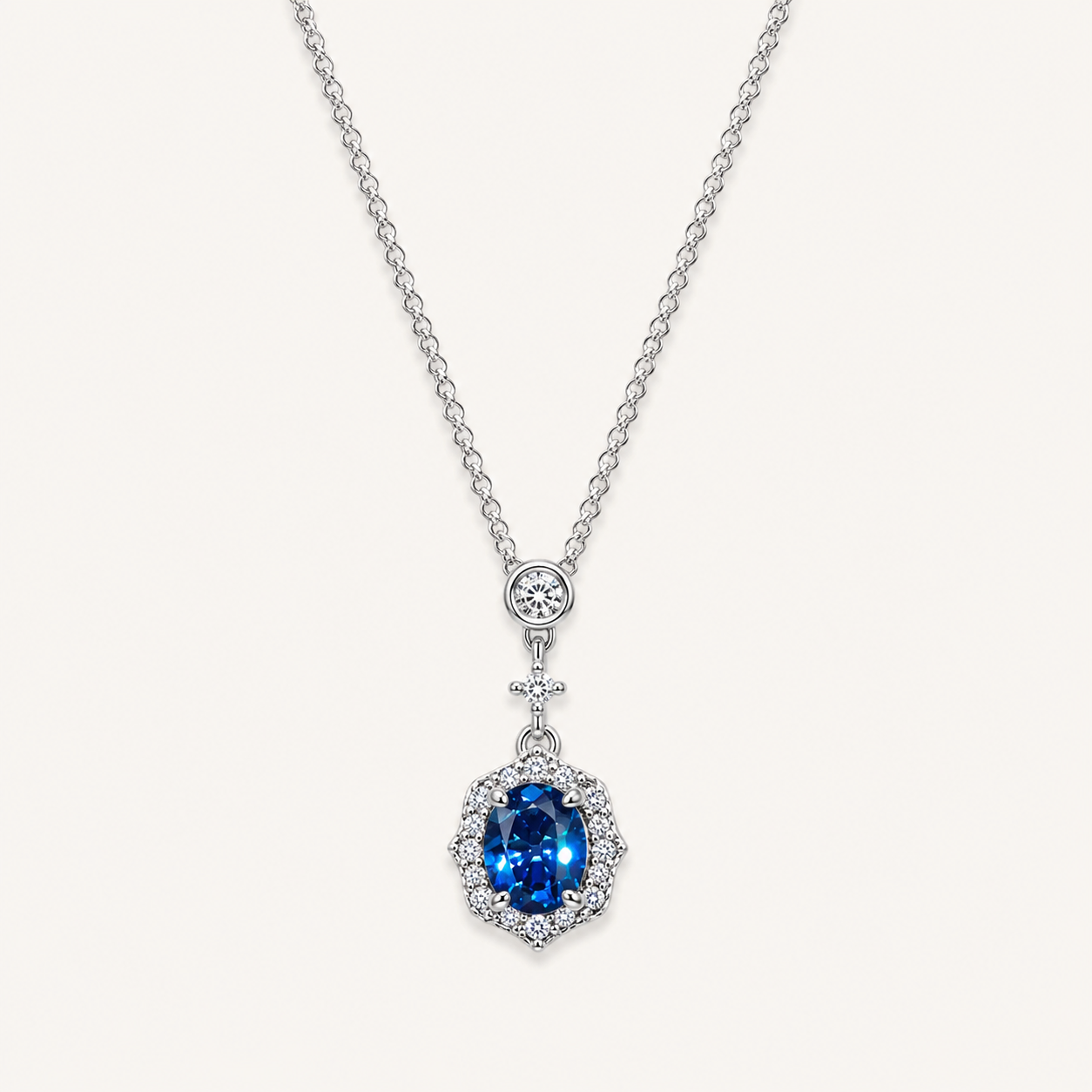 Elegant Lab-Grown Blue Sapphire Pendant Necklace with Silver-Tone Chain and Sparkling Zircon Halo