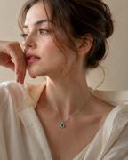 Emerald Halo Pendant Necklace – Round Cut Emerald Center Stone with Double Pavé CZ Surround in Sterling Silver