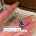 Elegant Lab-Grown Blue Sapphire Pendant Necklace with Silver-Tone Chain and Sparkling Zircon Halo