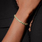 Emerald Green Crystal Tennis Bracelet with Gold-Plated Finish & Sparkling Rhinestone Halo