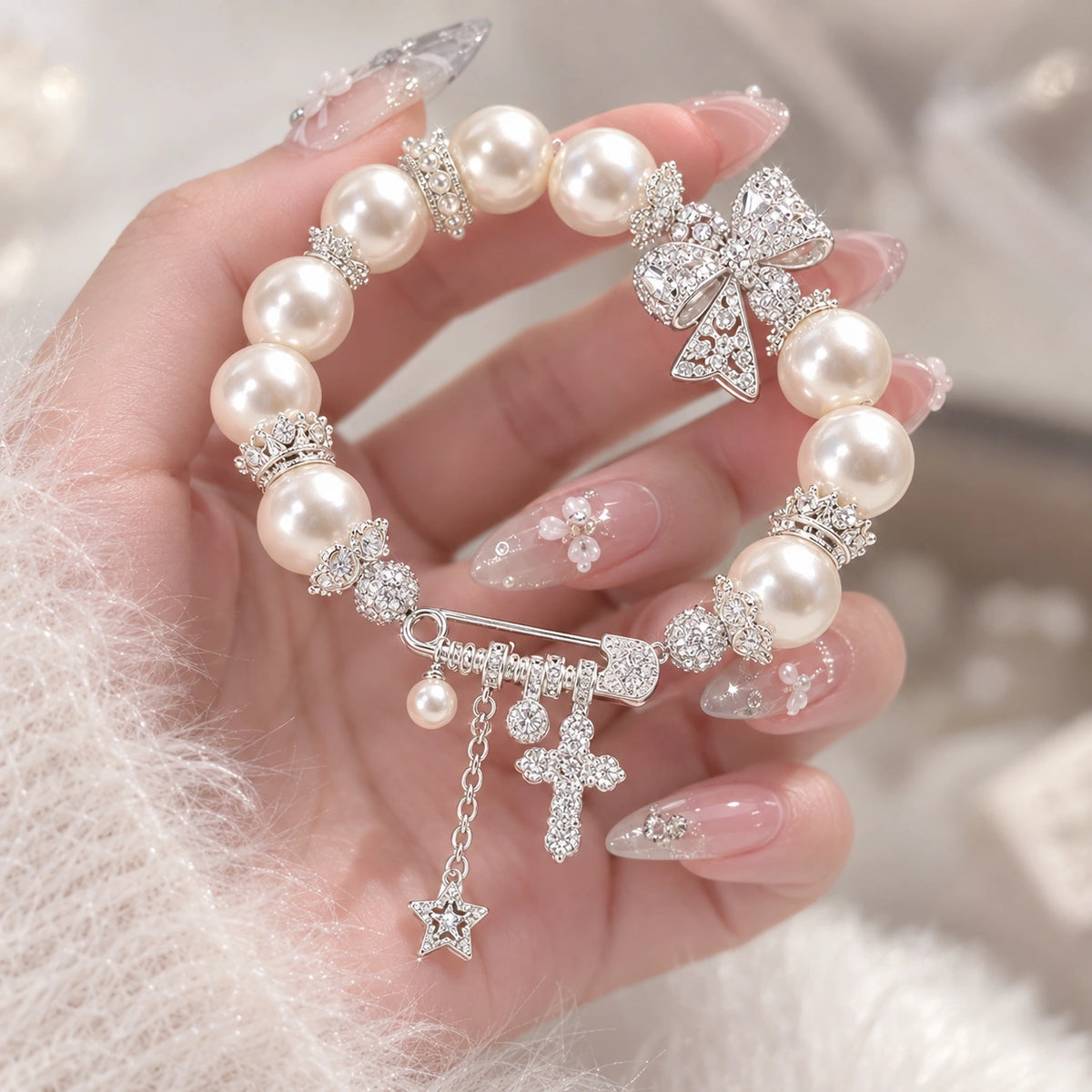 French-Inspired Pearl Bow Charm Bracelet – Crystal Cross & Star Statement Jewelry