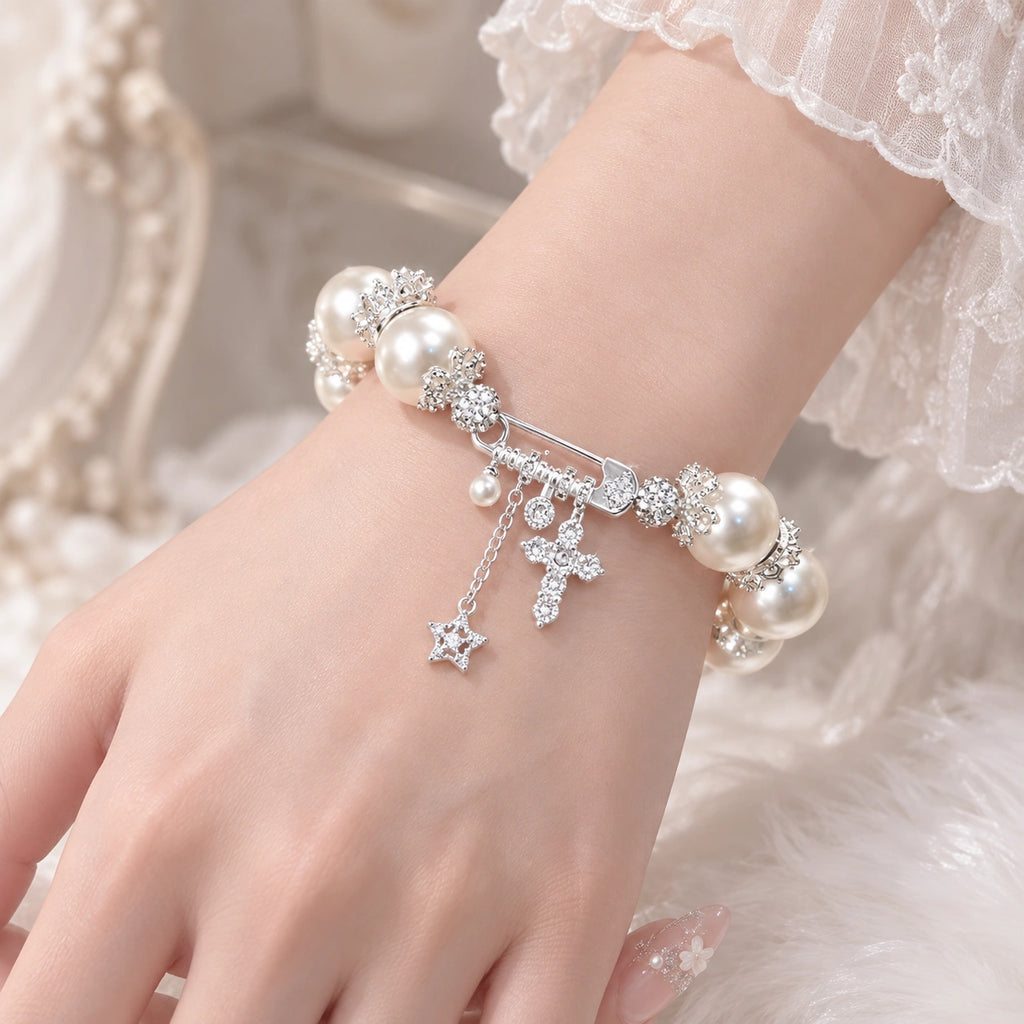 French-Inspired Pearl Bow Charm Bracelet – Crystal Cross & Star Statement Jewelry